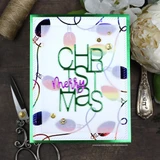 Card made with the Heart of Christmas dies. Die-cut 'Christmas' layered with 'merry' over a pastel background.