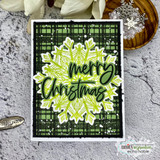 Card made with the Heart of Christmas dies — 'merry Christmas' over a green plaid snowflake.