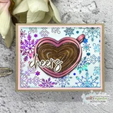 Snowflake card with a heart-shaped mug of cocoa and a 'cheers' sample sentiment.