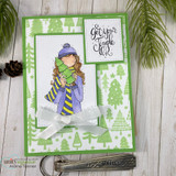 Green tree-patterned card with the bundled girl and the jingle sentiment framed, white bow below