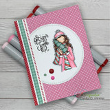Pink dotted card of the girl in a candy-striped scarf inside a stitched circle