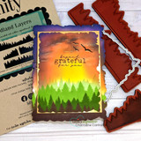 Card with a sunset forest silhouette and 'brave & grateful for you.'