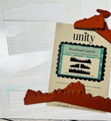Product shot of the Woodland Layers stamp and stencil packaging with the layered forest die.