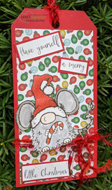 Colored Santa-hat mouse on a red tag over green-and-red dot paper with 'Have yourself a merry little Christmas.'