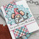 Santa-hat mouse making a snow angel on a plaid-and-snowflake card with 'Have yourself a merry little Christmas.'