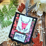 Tag card of the colored deer on a red panel with "joyful."