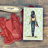 Card with a single girl on a green diamond-patterned panel.
