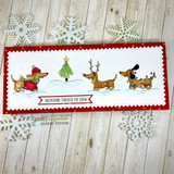 Snowflake scene card with dachshunds and trees on a snowy strip labeled 'Dachshund through the snow'