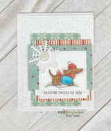 Winter card of a dachshund in a blue coat dashing under snowflakes with 'Dachshund through the snow'