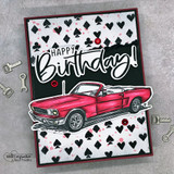 A bold Happy Birthday greeting hand-stamped on a card and lettered "That's a lot of candles."