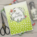 Card with the floral wreath and 'happy birthday' on a green polka-dot panel.