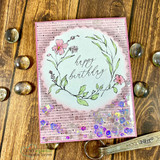 Pink shaker card with the wildflower wreath, 'happy birthday.'