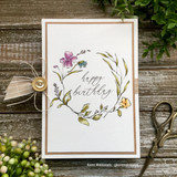 Kraft card with the softly colored wreath, 'happy birthday.'