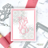 Handmade card featuring a layered scalloped and stitched rectangle die-cut frame.