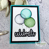 Handmade card featuring a layered scalloped and stitched rectangle die-cut frame.