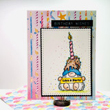 Handmade card featuring a layered scalloped and stitched rectangle die-cut frame.