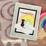 A scalloped die frame around a stamped dog and rainbow scene, 'our hearts go out to you.'