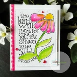 A scalloped die frame around a bold floral on a card, 'the Lord will fight for you.'