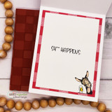 Humorous card on buffalo plaid with a little goat and a cheeky sentiment.