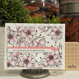 Neutral card of the magnolia background on a scalloped frame, 'you're loved each day throughout the year.'