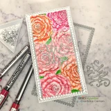 Slimline card filled with roses watercolored in coral, pink and orange behind a silver Mr and Mrs die-cut.