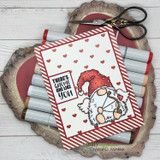 Card with the gnome over red and white stripes and hearts, 'There's gnome one like you'