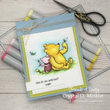 Clean white card of Pooh and Piglet strolling with 'How do you spell love? -piglet' on a corner banner.