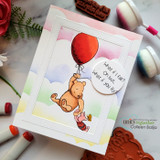 Soft pastel card of Pooh hanging from a red balloon with the what-if-you-fly quote in a circle tag.