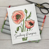 Soft coral poppies on a stitched white card with the sentiment 'Sending Prayers', shown with alcohol markers