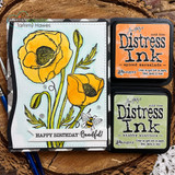 Yellow poppies with a tiny bee on a blue watercolor card with 'Happy Birthday Beautiful!', shown with Distress Ink pads