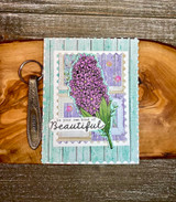 Card of the purple lilac framed on woodgrain, 'be your own kind of Beautiful'.
