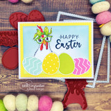 Happy Easter card pairing the bandana chicken with three colorful decorated eggs.