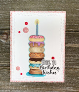 Handmade birthday card with Angie Blom's tall stack of frosted, sprinkled donuts topped by a lit candle, banner reading 'Happy Birthday, you definitely donut look your age'.