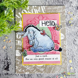Hello card of Eeyore on layered pink patterned panels with 'Just a card... for no very good reason at all.'