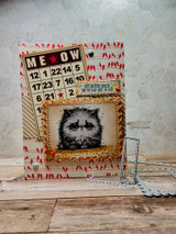 Handmade card featuring a scalloped postage-stamp die-cut frame around the artwork.