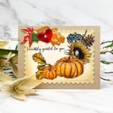 Handmade card featuring a scalloped postage-stamp die-cut frame around the artwork.