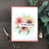 A cluster of daisies and sunflowers colored in pink and yellow on a soft card — 'Hi Hey Hello.'