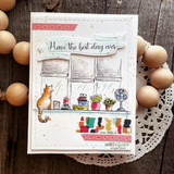 Clean card with the plant-lined windowsill and orange cat and 'Have the best day ever' on a torn strip.