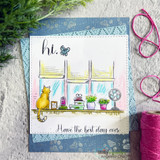 Card with an orange tabby on the colored windowsill scene and 'hi' with 'Have the best day ever.'