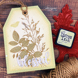 Handmade gift tag or card made with a stitched tag die.