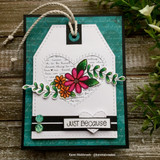 Teal tag card layered with a Dashes and Frills die-cut heart element.