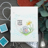 Soft spring card using a Dashes and Frills die-cut heart accent.