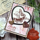 Vintage card framed with a Dashes and Frills scalloped heart die cut.