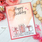 Wrapped gifts and pink watercolor wash, 'Happy Birthday,' with a shaker element.