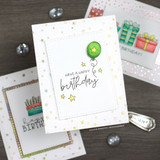 Green balloon and 'have a happy birthday' on a star-dot white card.