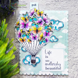 Card with the butterfly balloon in pink and yellow over an aqua cloud panel and the sentiment.