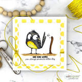 Yellow polka-dot card tied with yellow cord: the blue bird and the worm on a strip of grass with the kindness sentiment.