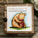 Vintage newsprint card of Pooh with the day-without-a-friend sentiment above