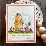Pink scalloped card of Pooh and Piglet with the 'difficult days' quote in the meadow.
