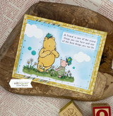 Sky-blue card of the friends on a woodgrain plaque with the 'nicest things' quote.